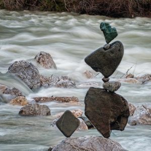 Stone balancing performer